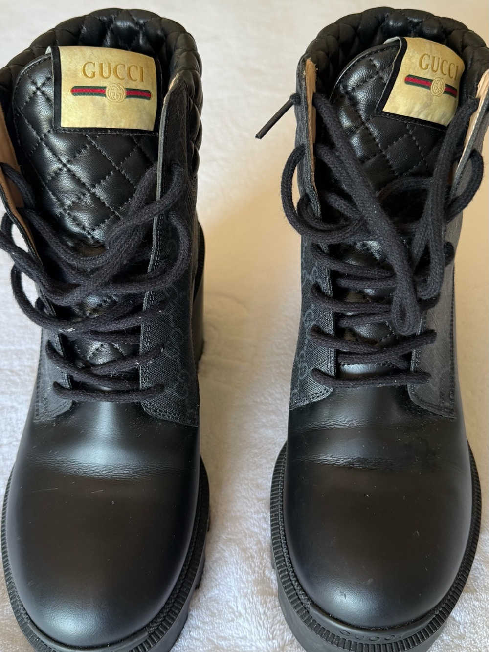 Gucci Black Quilted Leather Lace-Up Ankle Boots with Gold Logo Tags